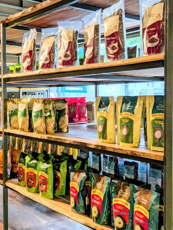 Shelves of ragi flakes, millet kanji mix, millet dosa mix and millet upma mix
